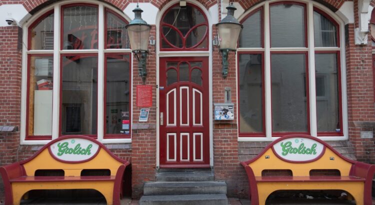 a couple of benches sitting in front of a building